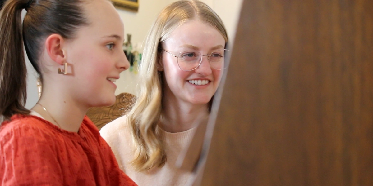 Sophie having a lesson with a female student